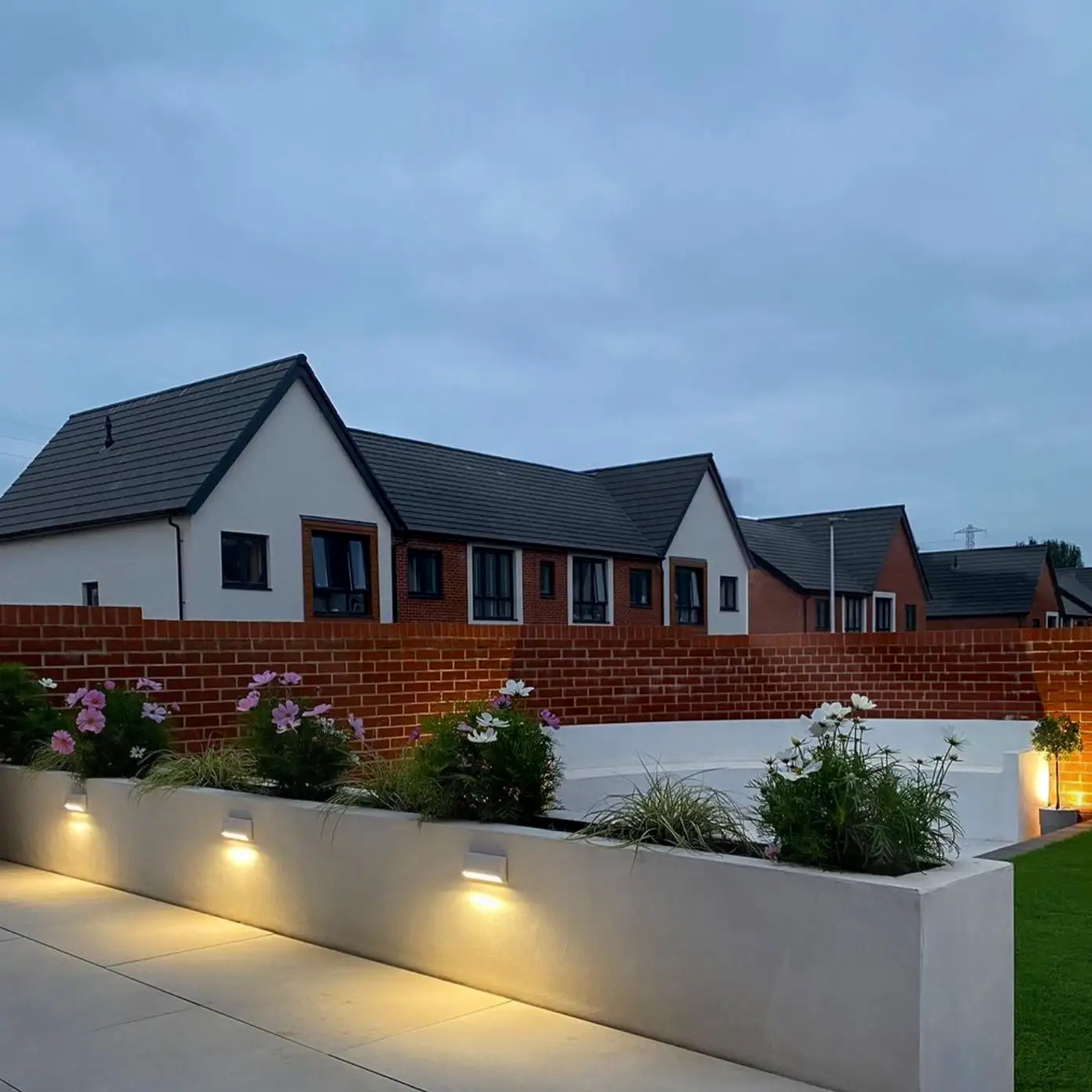 Photo of outdoor lighting being switched on.