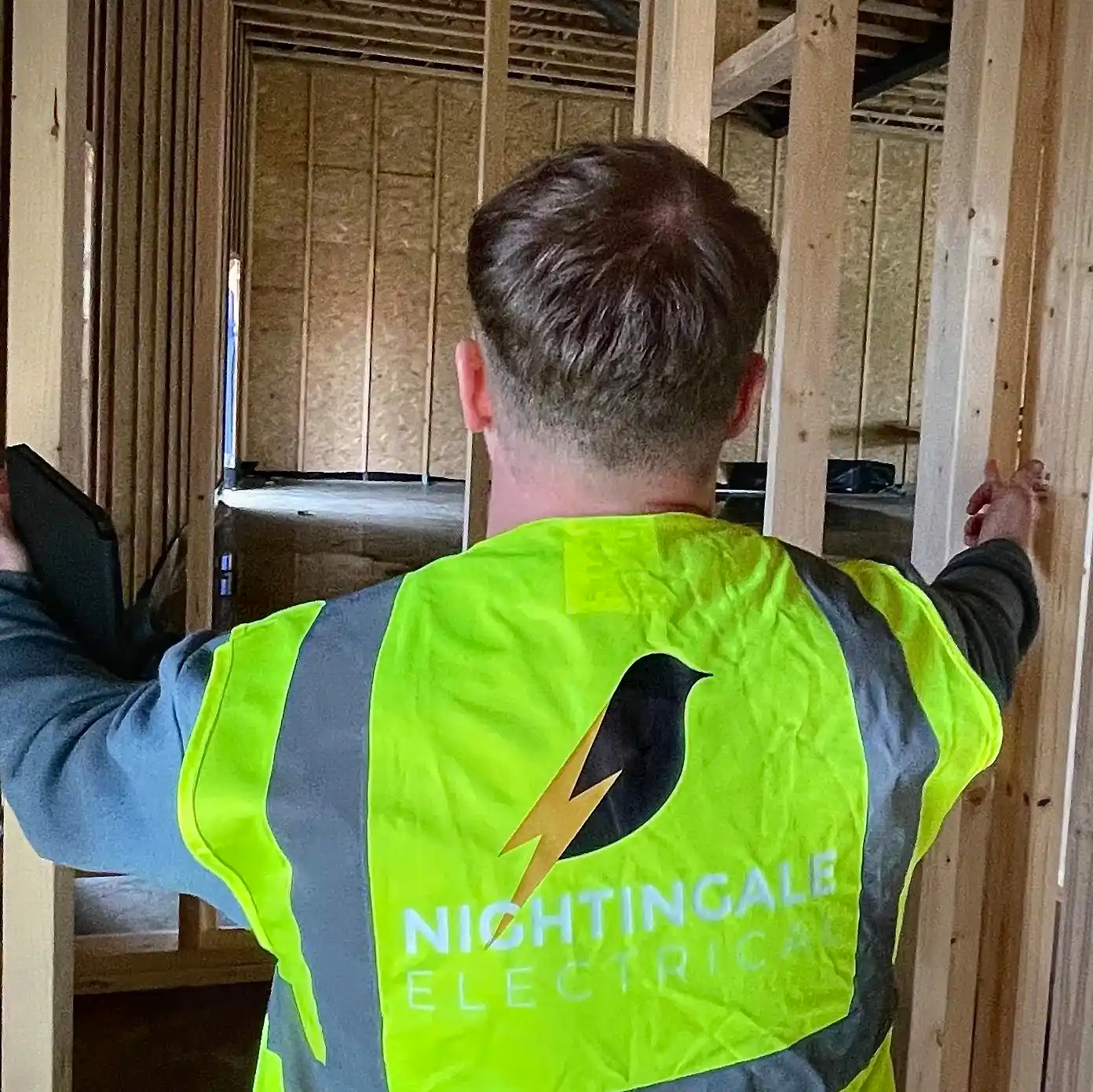 Photo of a Nightingale employee measuring.